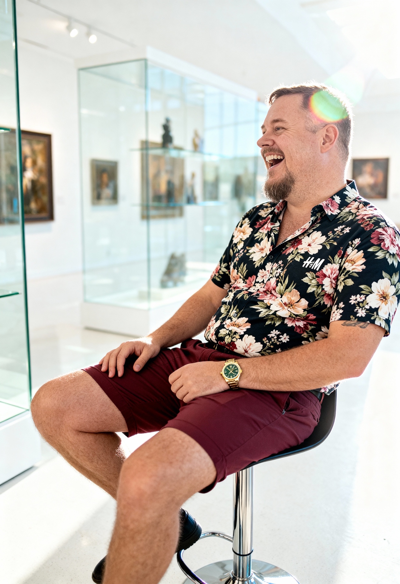 Brent laughing in a gallery